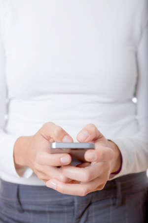 closeup of a young woman hands using a mobile phone - Stock Image ...