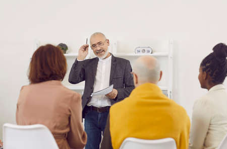 Senior man who is an experienced corporate team manager or business ...