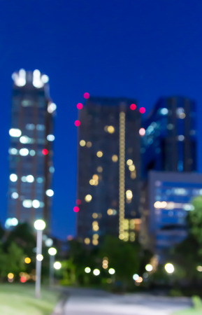 Abstract blurred bokeh lights, office building downtown night view ...
