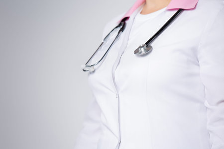 Cropped view of female doctor posing with stethoscope. Health care ...
