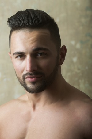 guy. Handsome man, sport model or bodybuilder with stylish hair