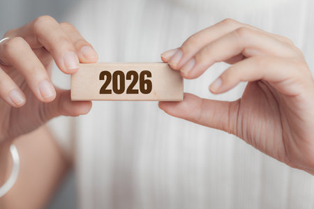 Female hand holding wooden ...