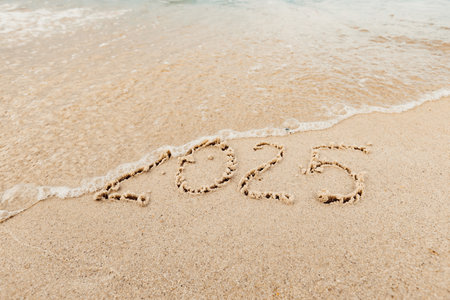 Inscription 2005 on the beach