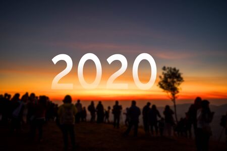 year 2020 on abstract blurr...