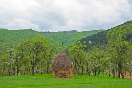 Mountain landscape and haystackの写真素材