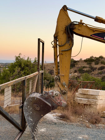 A crawler excavator stands at a construction site. Construction machinery and equipment.の写真素材