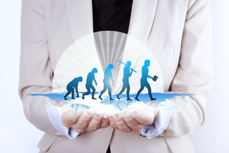Human evolution  Growth in businesswoman hands. Photo of a woman  businesswoman with hands extended...