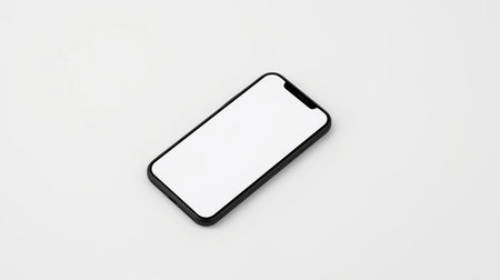 Black mobile phone with blank screen isolated on white background. Top view.の素材