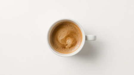 Top view of a cup of coffee on a white background with copy spaceの素材