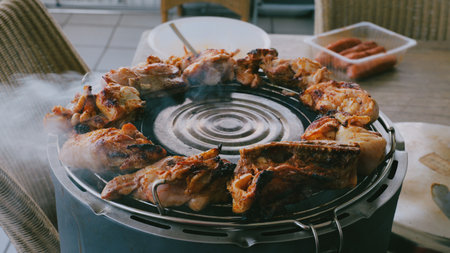 Grilled chicken on the grill. Grilled chicken on a barbecue.の写真素材