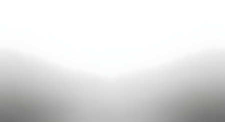 Abstract gray background with some smooth lines in it and a spotlight on itの素材