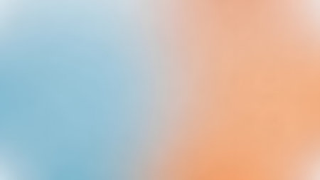 Abstract blurred orange and blue gradient background. Colorful bokeh.の素材