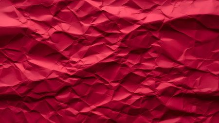 Red crumpled paper background. Red crumpled paper texture.の素材