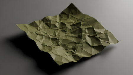 Green crumpled paper on a dark background. 3d renderingの素材