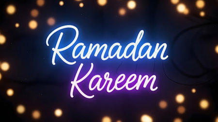 Ramadan Kareem calligraphy lettering on blurred lights backgroundの素材
