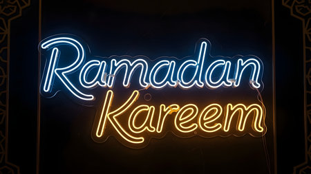 Ramadan Kareem neon sign. Arabic text Ramadhan Kareem.の素材