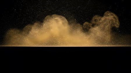 3d rendering of a golden dust cloud on a black background.の素材