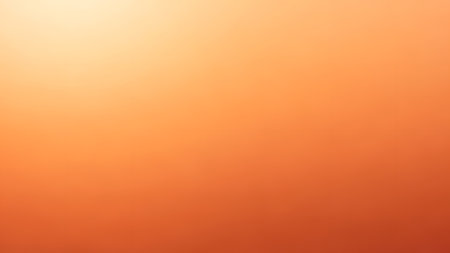 Abstract orange background with bokeh defocused lights and shadow.の素材