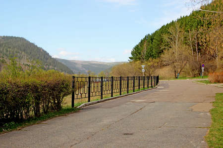 An observation deck with amazing views of wooded hills and blue sky.の写真素材