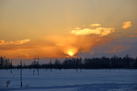 Winter landscape of the countryside at sunset.の写真素材