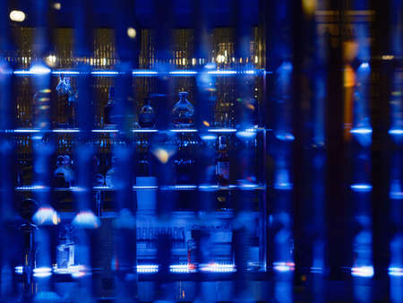 Alcohol shop window at nightのeditorial素材
