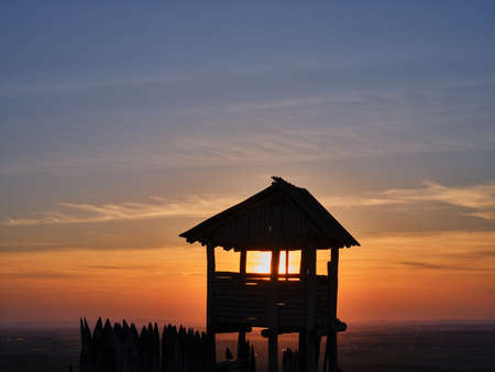 Wooden lookout tower and sunset at Braunsberg, Hainburg, Austriaの写真素材
