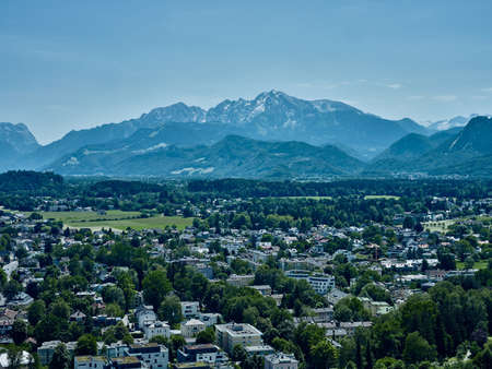 Top view of a residential area of Salzburg and hills in the background, Austriaの写真素材