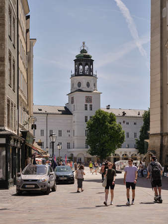 Residenzplatz and Neue Residenz (Neu Residence) building tower with bells in Sazlburg, Austriaの写真素材