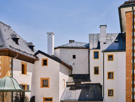 Beautiful facade of the old fortress houses in Salzburg with windows, Austria