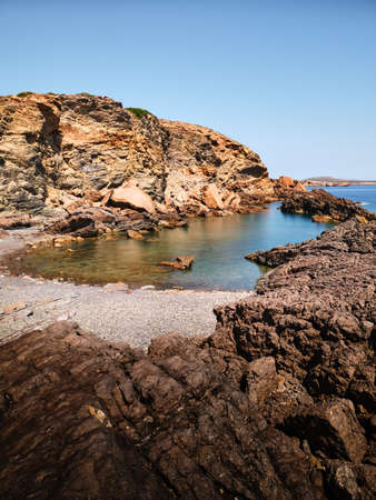 Rocks and sea in long exposure in Menorca island, Spainの写真素材