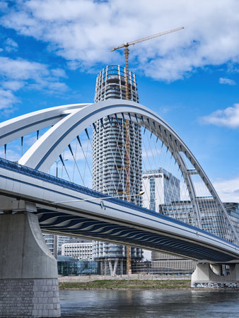 View of the highest skyscraper in Slovakia across the Apollo bridge in Bratislavaのeditorial素材