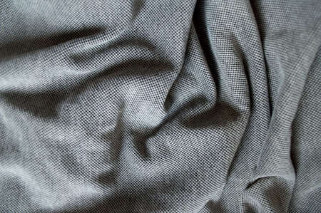 Crumpled fabric background and texture of gray colo. abstract background.