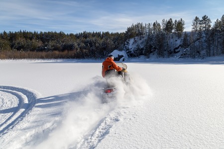 Athlete on a snowmobileの写真素材