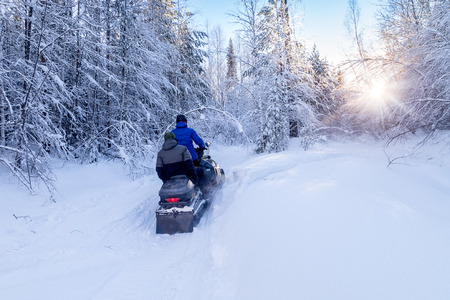 Walk on snowmobiles in the mountains of the Urals.