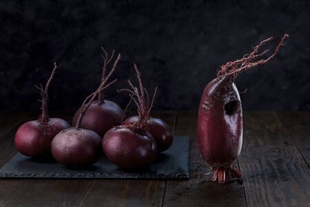 Lonely and sad beets, not like the others. The concept of loneliness.
