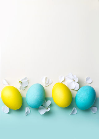 Happy Easter, straight colored eggs on a light background. Copy space.の写真素材