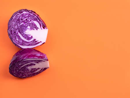 Red cabbage on an orange background. Copy space.の写真素材