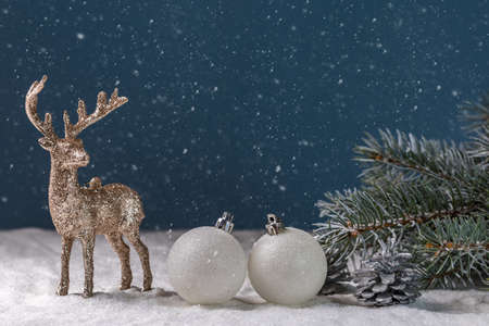Christmas card with a deer and Christmas decorations. Copy space.の写真素材