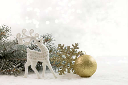 Christmas card with a deer and Christmas decorations. Copy space.の写真素材