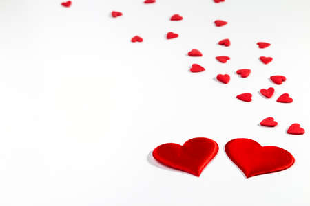 Valentine's day background with red hearts. Copy space.の写真素材
