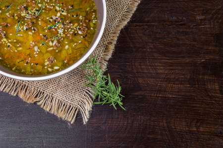 Vegetarian pea soup with sesame and sunflower seeds.の写真素材