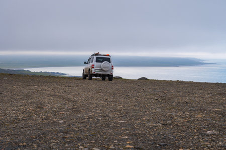 Russia, Murmansk region, Rybachy Peninsula. SUV on Cape Skorobeyevsky. August 2025.