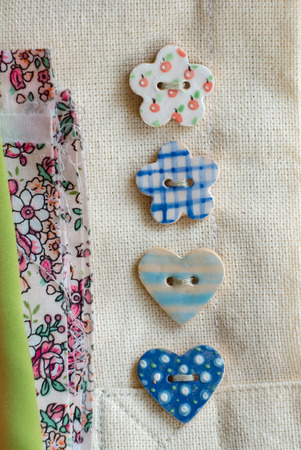 colorful ceramic handmade buttons as textile accessoryの写真素材