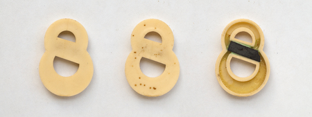 bright plastic cyrillic letters with magnet on white paperの写真素材