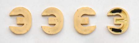 bright plastic cyrillic letters with magnet on white paperの写真素材