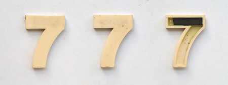 bright plastic cyrillic letters with magnet on white paperの写真素材