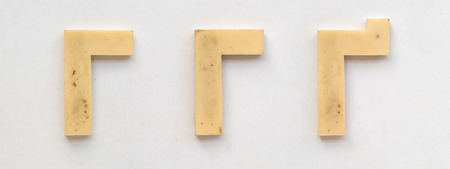 bright plastic cyrillic letters with magnet on white paperの写真素材