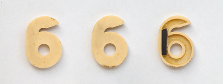 bright plastic cyrillic letters with magnet on white paperの写真素材