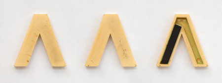 bright plastic cyrillic letters with magnet on white paperの写真素材