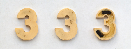 bright plastic cyrillic letters with magnet on white paperの写真素材